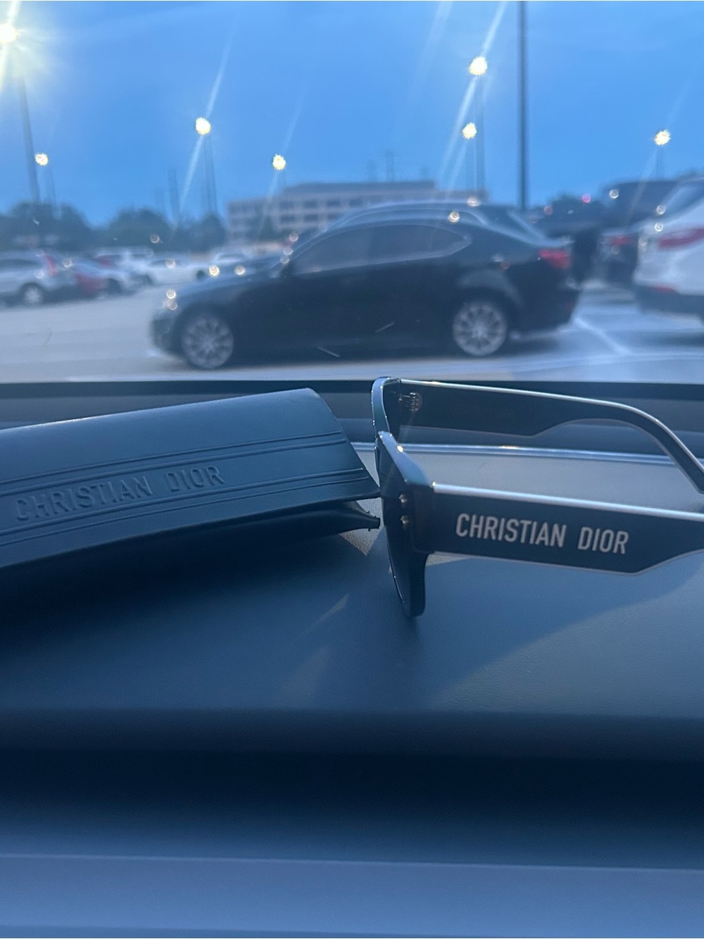 Dior Woman’s Black Sunglasses with White Logo Accents